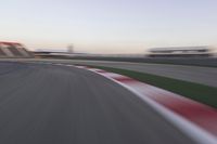 Dawn Over the Race Track: Clear Sky and Racing