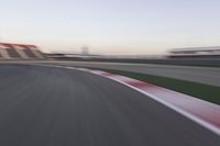 Dawn Over the Race Track: Clear Sky and Racing