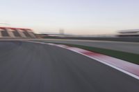 Dawn Over the Race Track: Clear Sky and Racing