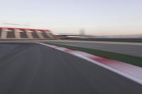 Dawn Over the Race Track: Clear Sky and Racing