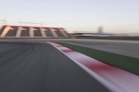 Dawn Over the Race Track: Clear Sky and Racing