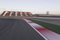 Dawn Over the Race Track: Clear Sky and Racing