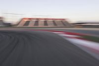 Dawn Over the Race Track: Clear Sky and Racing