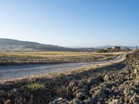 Dawn Over Tuscan Landscape: Clear Sky and Serene Beauty