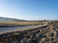 Dawn Over Tuscan Landscape: Clear Sky and Serene Beauty