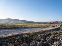 Dawn Over Tuscan Landscape: Clear Sky and Serene Beauty