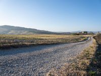 Dawn Over Tuscan Landscape: Clear Sky and Serene Beauty