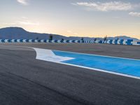 Dawn on a Race Track: Asphalt in the USA with Clouds