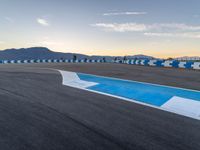 Dawn on a Race Track: Asphalt in the USA with Clouds