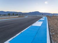 Dawn at the Race Track: A Cloudy Setting for an Exciting Race