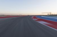 Dawn at the Race Track Stadium: A Clear Sky for Racing