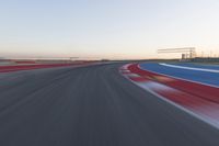 Dawn at the Race Track Stadium: A Clear Sky for Racing