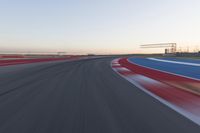 Dawn at the Race Track Stadium: A Clear Sky for Racing