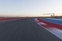 Dawn at the Race Track Stadium: A Clear Sky for Racing