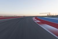 Dawn at the Race Track Stadium: A Clear Sky for Racing