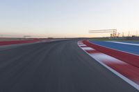 Dawn at the Race Track Stadium: A Clear Sky for Racing