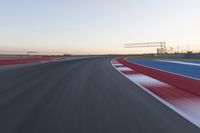 Dawn at the Race Track Stadium: A Clear Sky for Racing