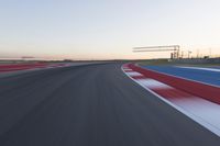 Dawn at the Race Track Stadium: A Clear Sky for Racing