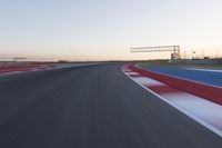 Dawn at the Race Track Stadium: A Clear Sky for Racing