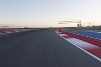 Dawn at the Race Track Stadium: A Clear Sky for Racing