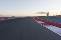 Dawn at the Race Track Stadium: A Clear Sky for Racing