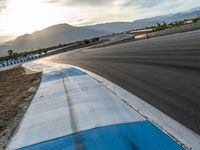 Dawn at the Race Track: Sun Visible Through the Clouds