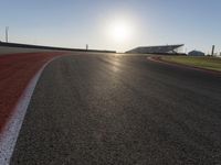 Dawn at the Race Track: Sunshine Illuminates the Grandstand