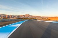 Dawn Racing: A Curve on the Asphalt Track