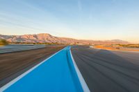 Dawn Racing: A Curve on the Asphalt Track