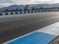 Dawn Racing on a Curve: Asphalt and Sun
