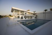 Dawn Reflection: Swimming Pool in Open Space