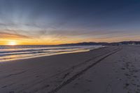 Dawn on a Coastal Road: Sand, Water, and Open Space