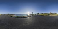 a 360 - ball view of the street as seen from the top of a hill