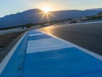 Dawn at a Race Track in the USA: Asphalt and Sunshine