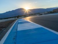 Dawn at a Race Track in the USA: Asphalt and Sunshine