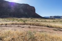 Daytime in Canyonlands: Clear Sky and Majestic Mountains