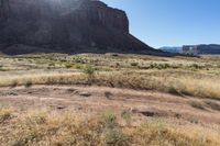 Daytime in Canyonlands: Clear Sky and Majestic Mountains