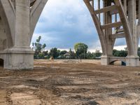 the ground beneath a bridge has been cleared from its contents and ready to be placed