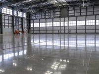 Daytime Factory Reflection on Concrete Surface