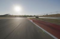 Daytime Highway with a Clear Sky and Visible Sun