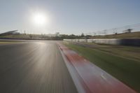 Daytime Highway with a Clear Sky and Visible Sun