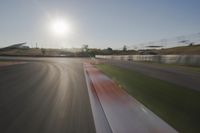 Daytime Highway with a Clear Sky and Visible Sun