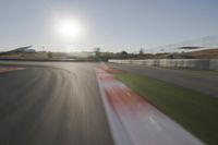 Daytime Highway with a Clear Sky and Visible Sun