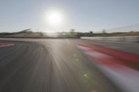 Daytime Highway with a Clear Sky and Visible Sun