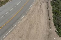 Daytime Highway Road: Asphalt and Sand