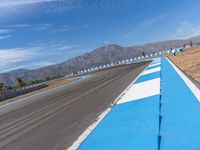 Daytime at a Race Track in the USA with Fluffy Clouds