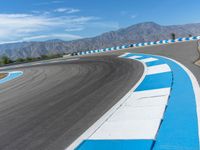 Daytime at a Race Track in the USA with Fluffy Clouds