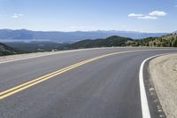 Daytime Road through the Asphalt Highlands of Colorado's Nature