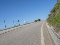 Daytime on a Low Slope Road with Asphalt Surface