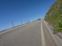 Daytime on a Low Slope Road with Asphalt Surface